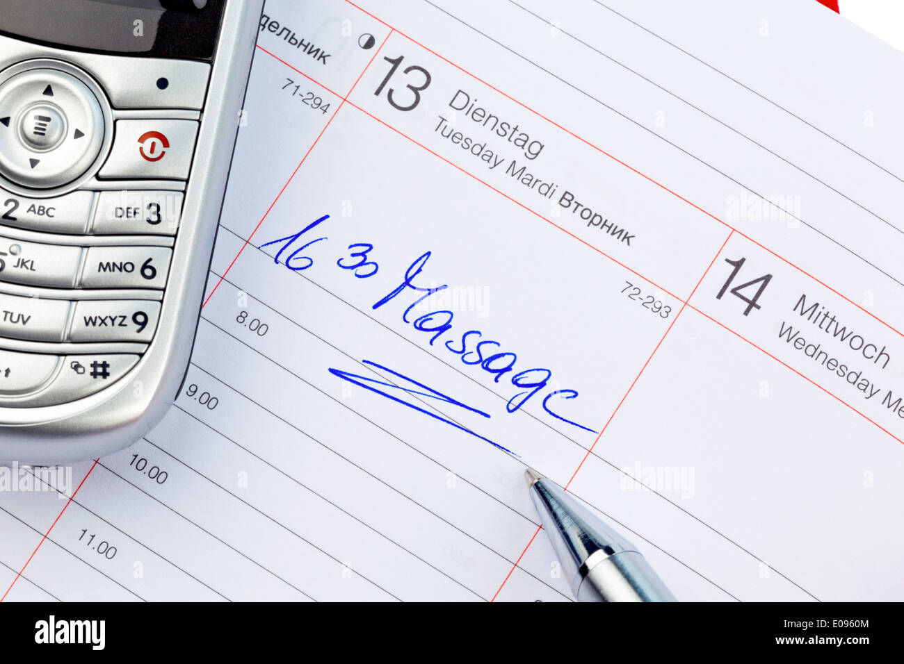 An appointment is put down in a calendar: Massage, Ein Termin ist in einem Kalender eingetragen: Massage Stock Photo