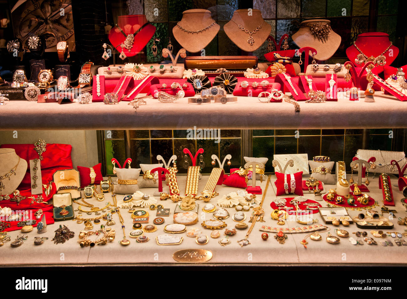 Gold Jewellery Jewels watches rings necklaces in shop window on Il Ponte Vecchio old bridge Florence Italy Stock Photo