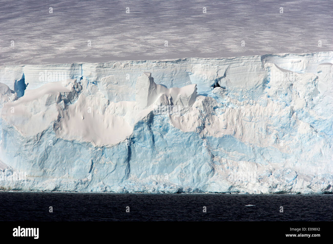 glacier face with blue and white ice arctowski peninsula Antarctica