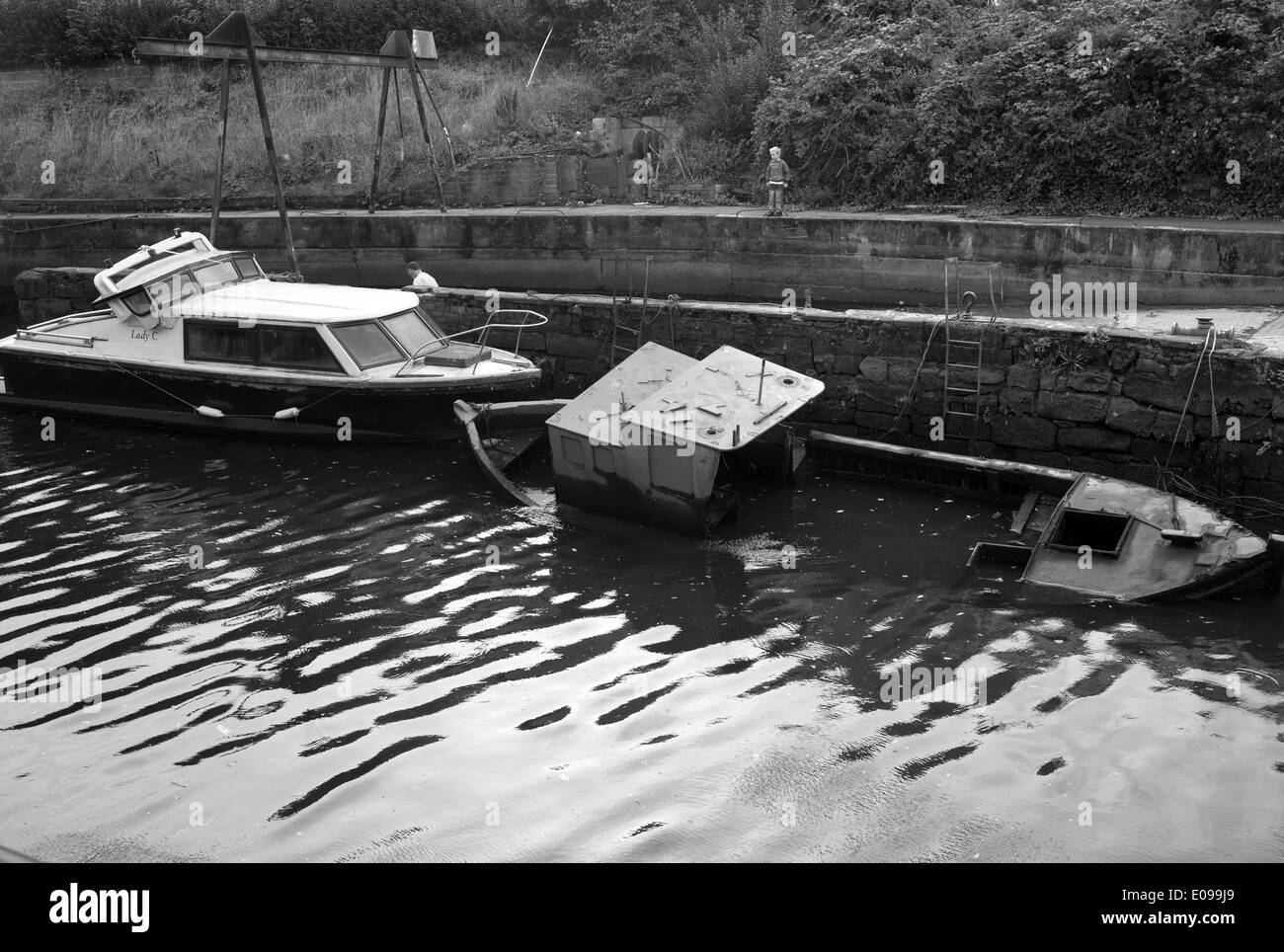 Sunken boat in the Ouseburn, Tyne and Wear Stock Photo