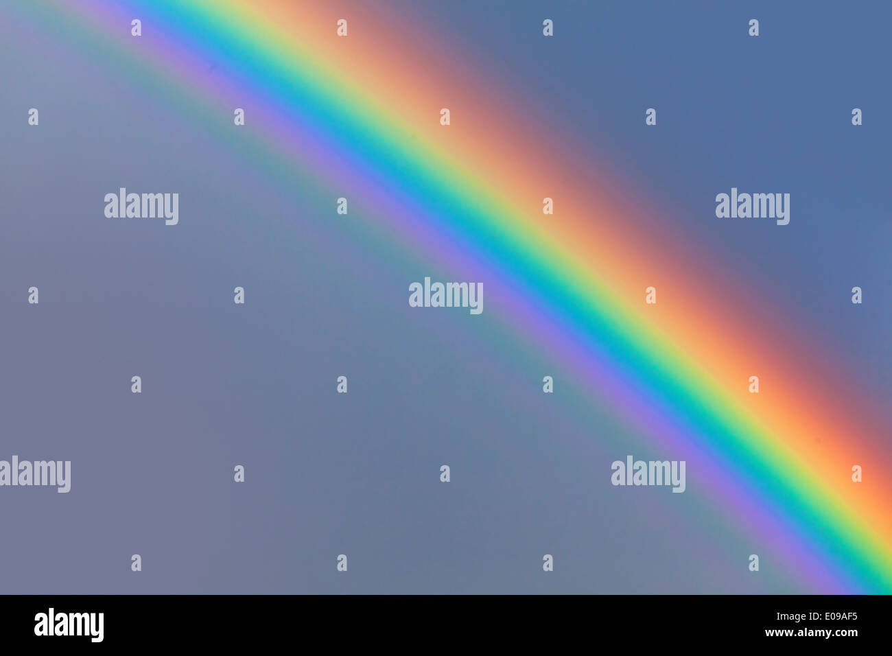 beautiful rainbow in blue sky after the rain Stock Photo - Alamy
