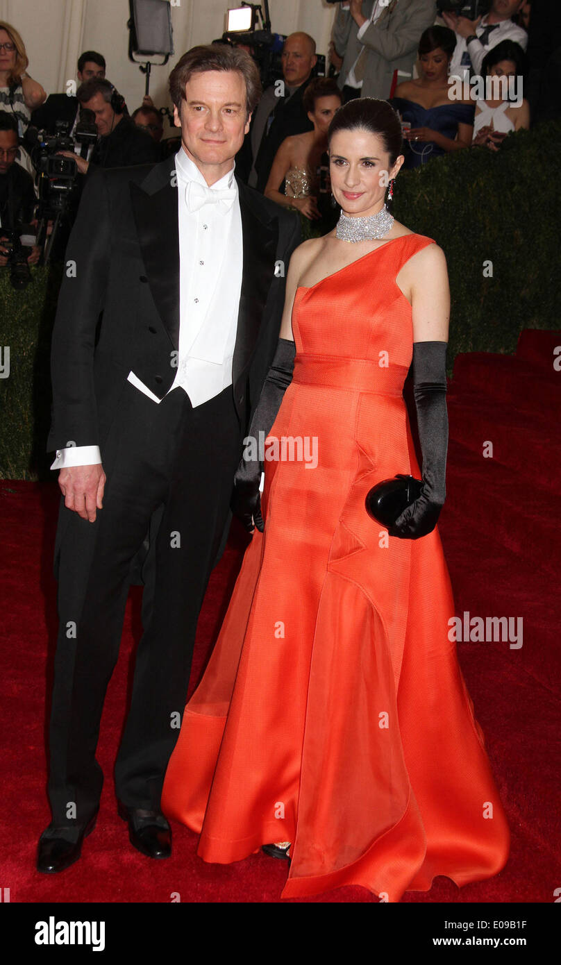 Feb. 27, 2011 - Hollywood, California, U.S. - Actor COLIN FIRTH wearing a Tom  Ford tuxedo and wife LIVIA GIUGGIOLI wearing a panelled gown recycled from  old dresses for the red carpet