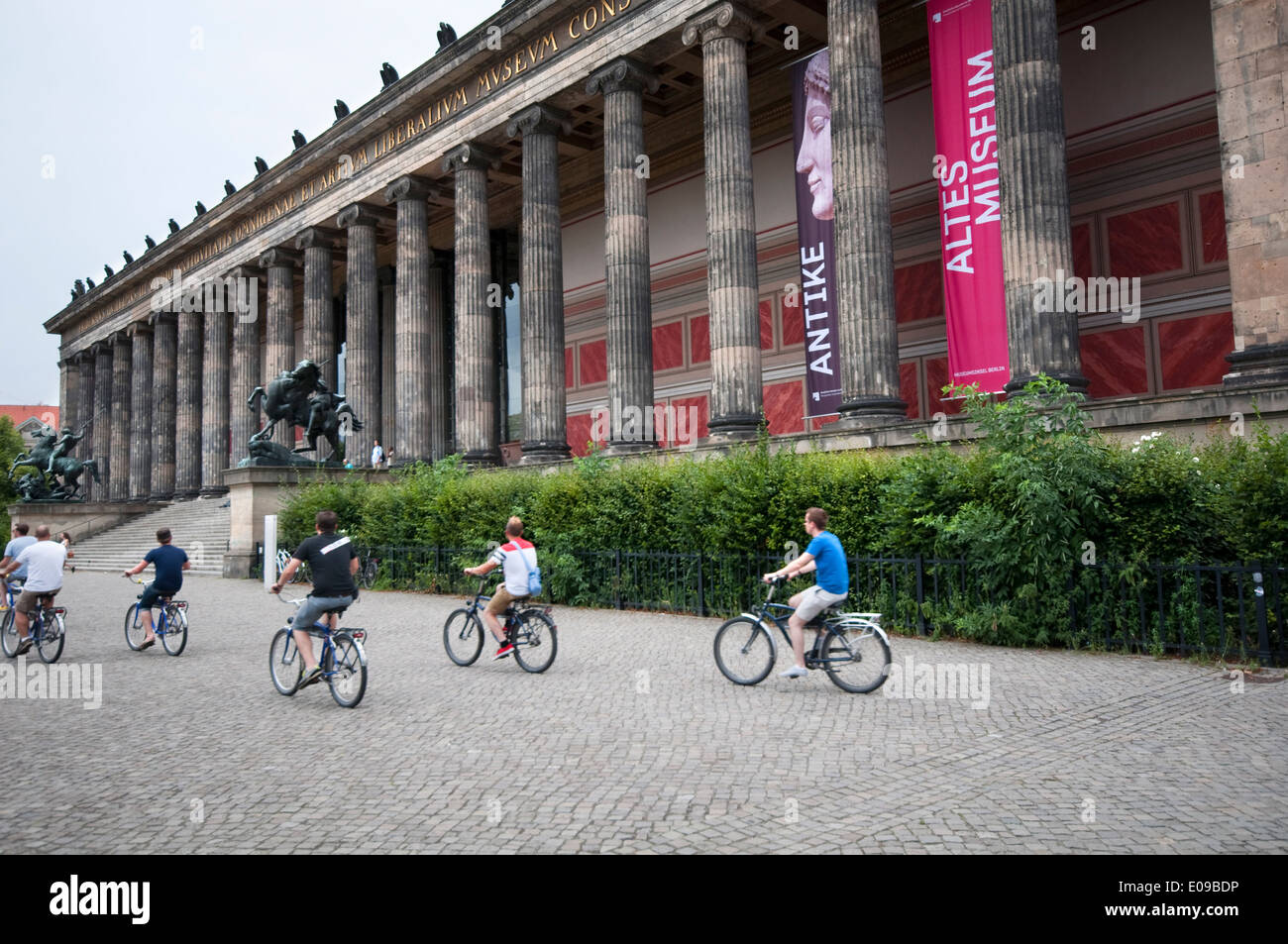 Germany, Berlin, Altes Museum, Bicyclist Stock Photo