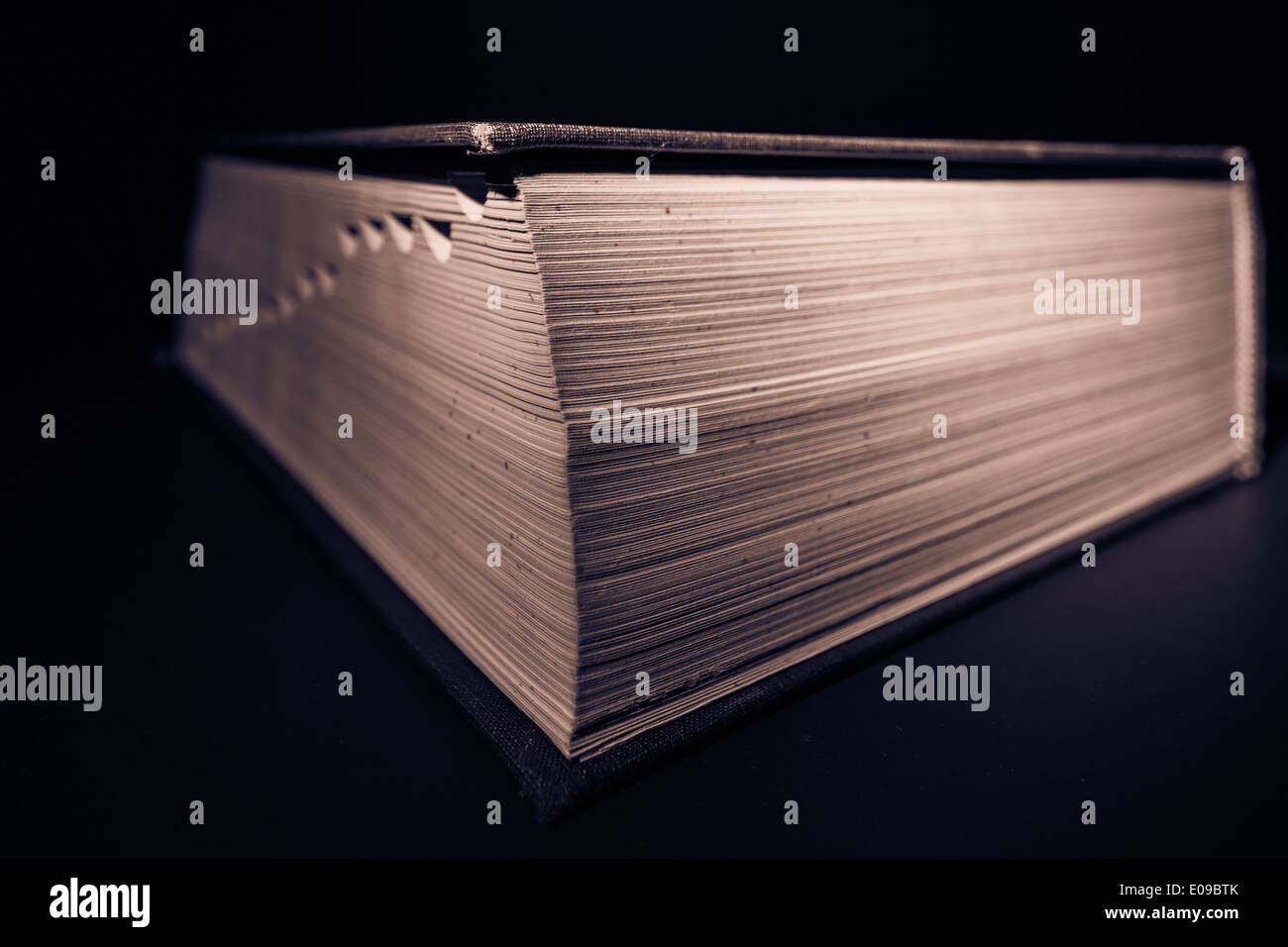 Book against black background Stock Photo