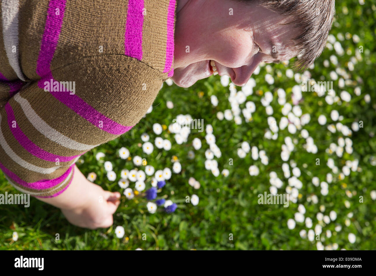 mentally disabled woman on a lawn Stock Photo