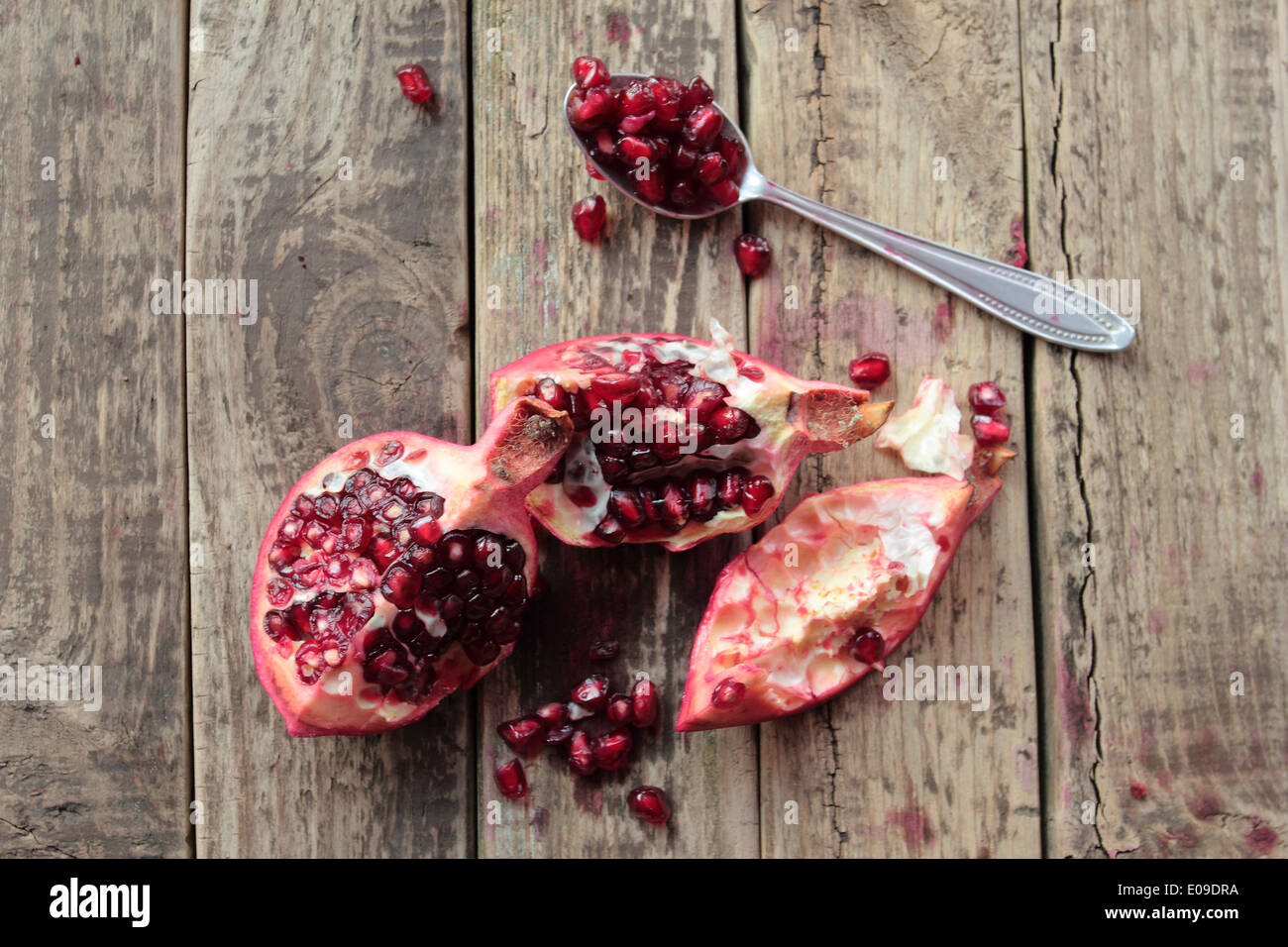 Fresh granate fruit on wooden table Stock Photo