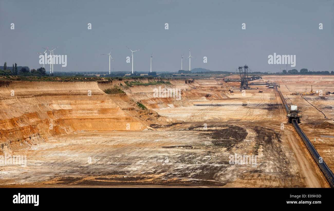 Germany, North Rhine-Westphalia, Garzweiler surface mine with wind turbines in background Stock Photo