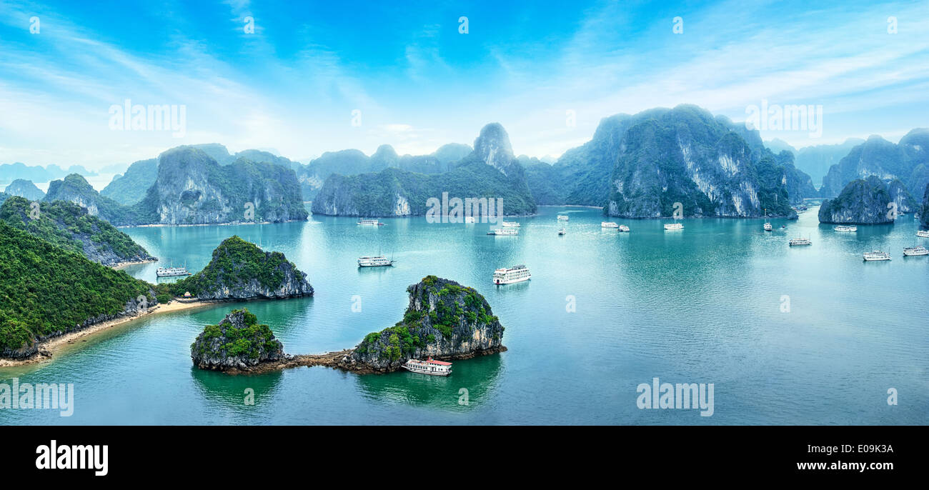 Tourist junks floating among limestone rocks at early morning in Ha Long Bay South China Sea Vietnam Southeast Asia Five images Stock Photo