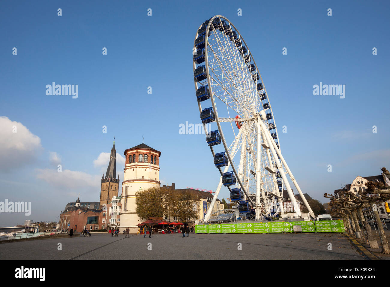 Germany, North Rhine-Westphalia, Duesseldorf, Burgplatz, Castle Tower, Shipping Museum, Lambertus Church and Big Wheel Stock Photo