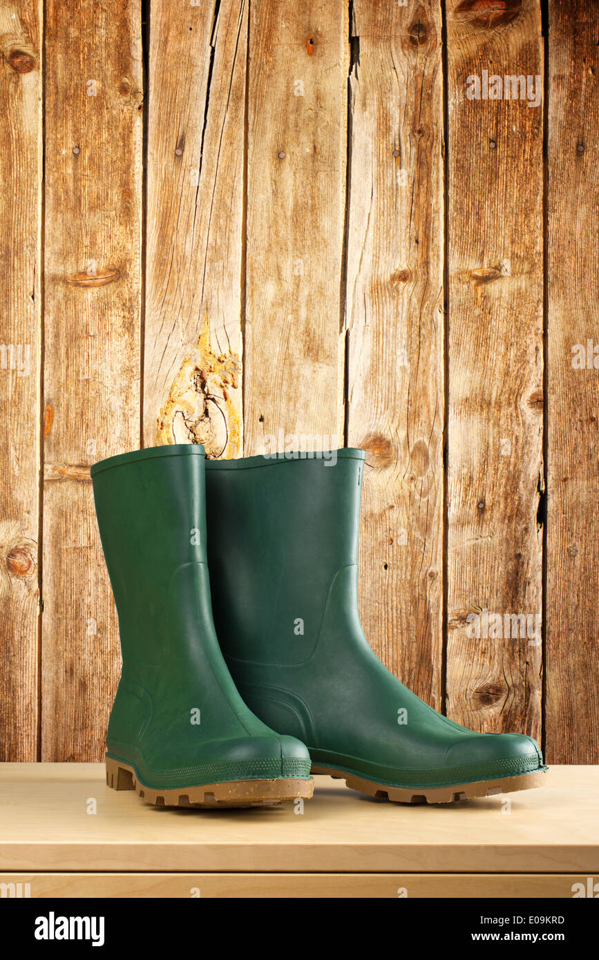 Green rubber boots. Agricultural working boots for all sorts of garden work Stock Photo Alamy