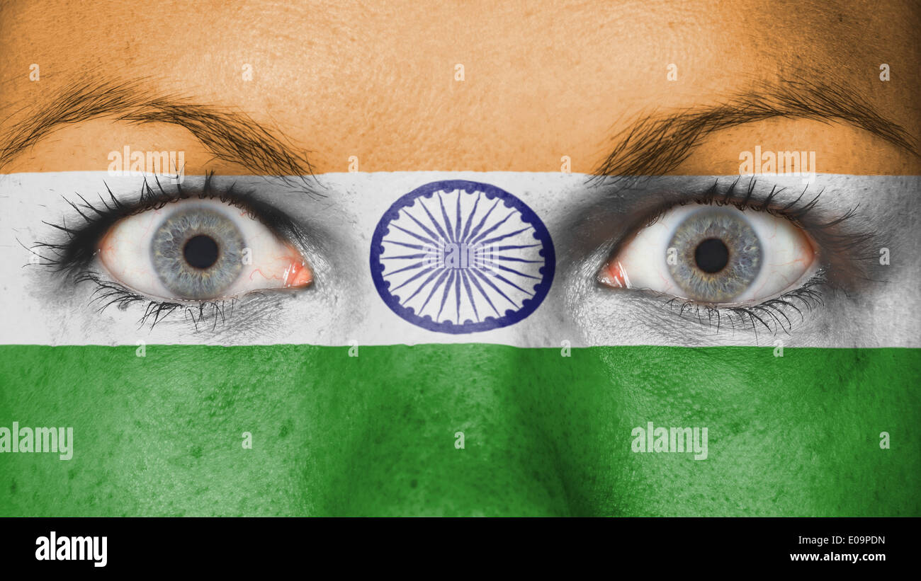 Close up of eyes. Painted face with flag of India Stock Photo