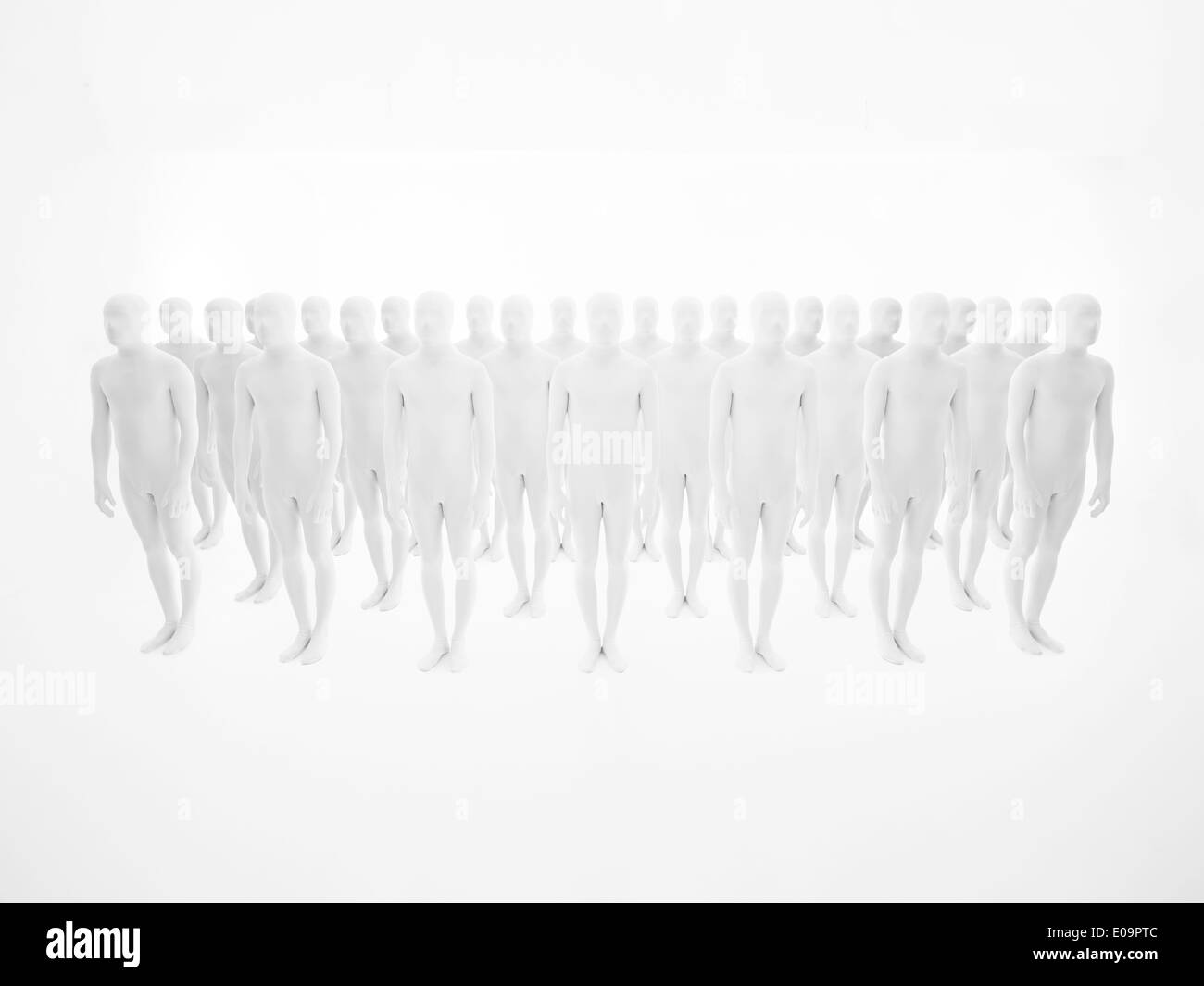people dressed in white suits aligned in multiple rows, shot in studio Stock Photo