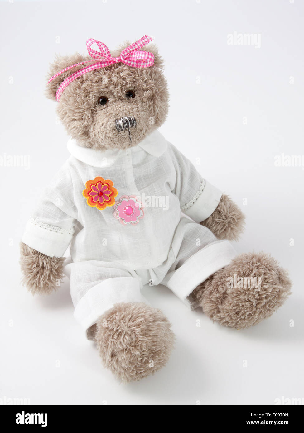 Teddybear girl with white clothes Stock Photo