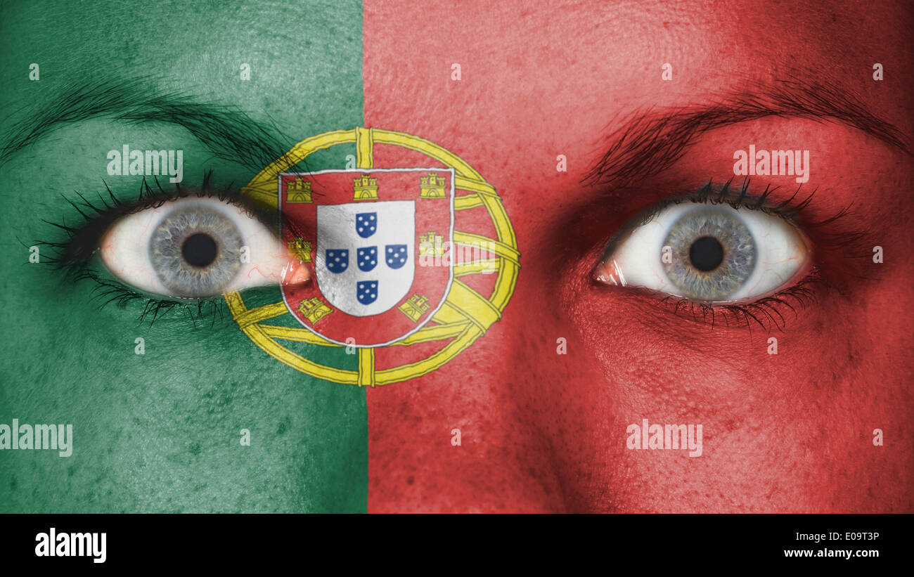 Close up of eyes. Painted face with flag of Portugal Stock Photo