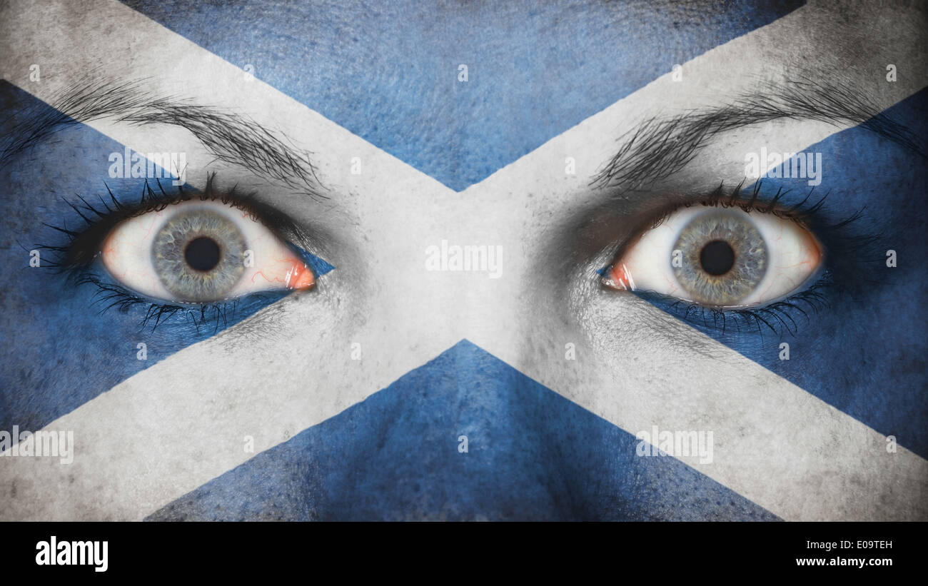 Close up of eyes. Painted face with flag of Scotland Stock Photo
