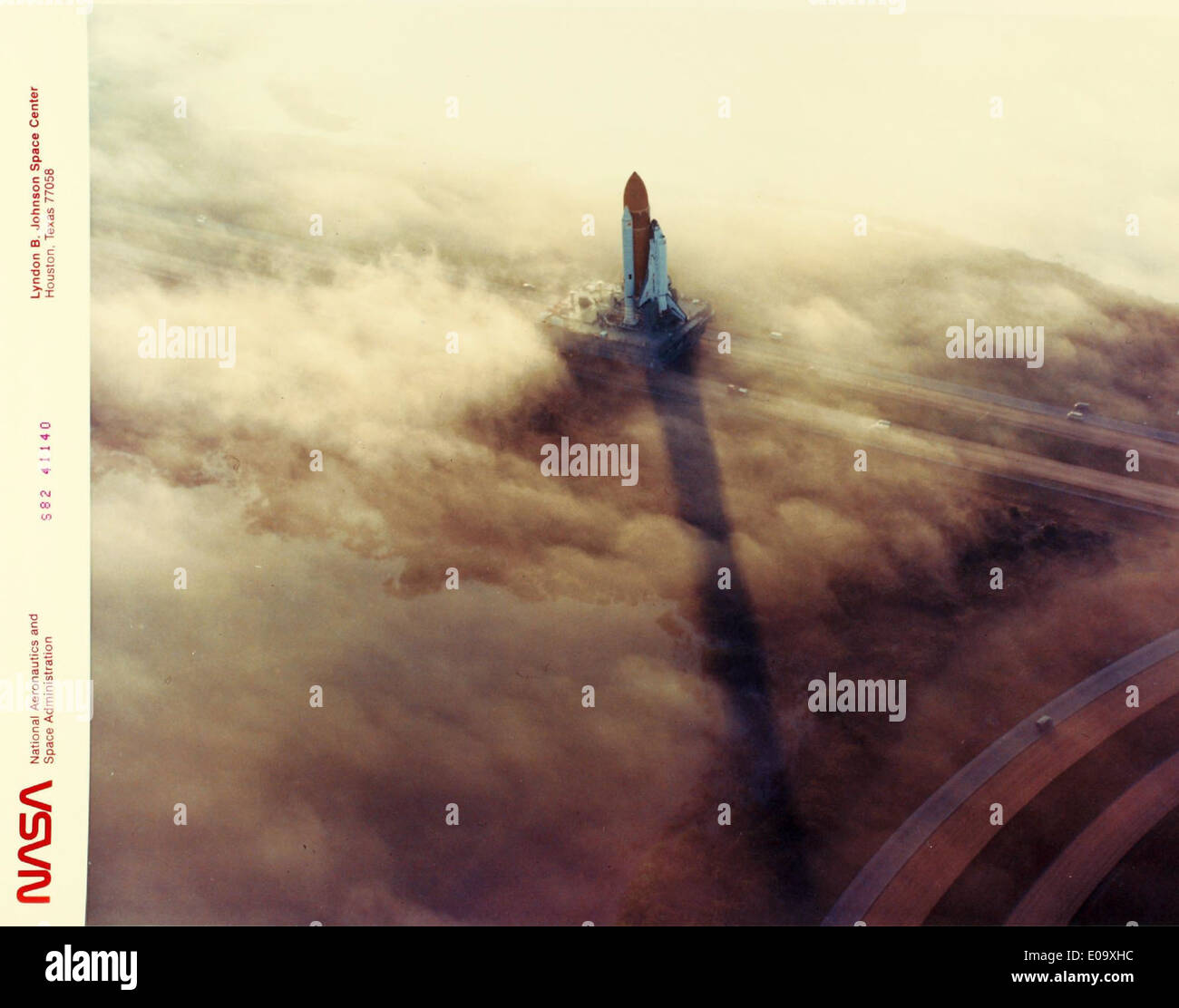 This glossy photo features the Space Shuttle Program, which operated ...