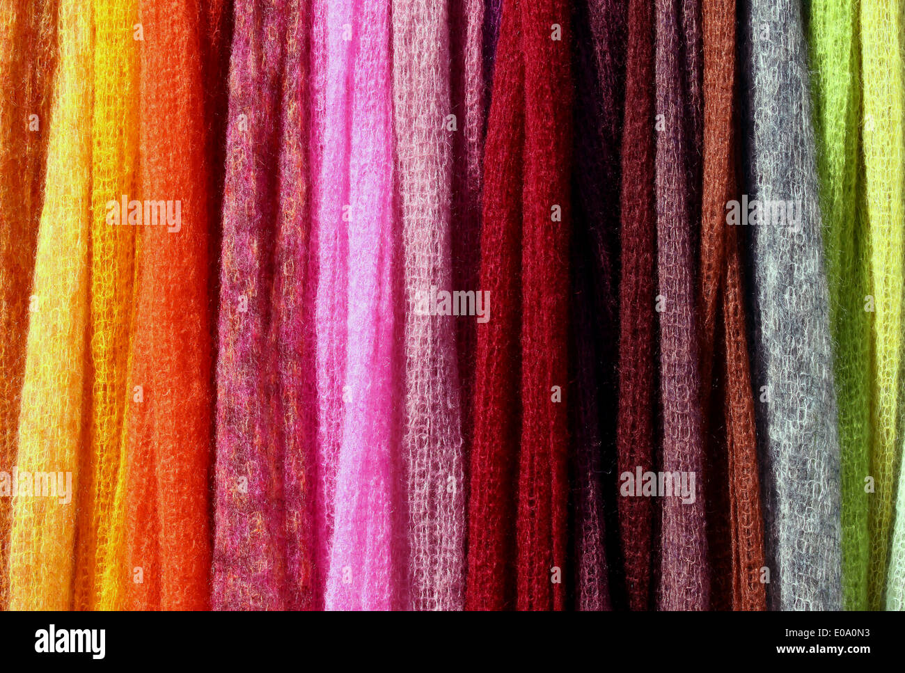 Multicolored knitted blankets, perfect stripes background Stock Photo