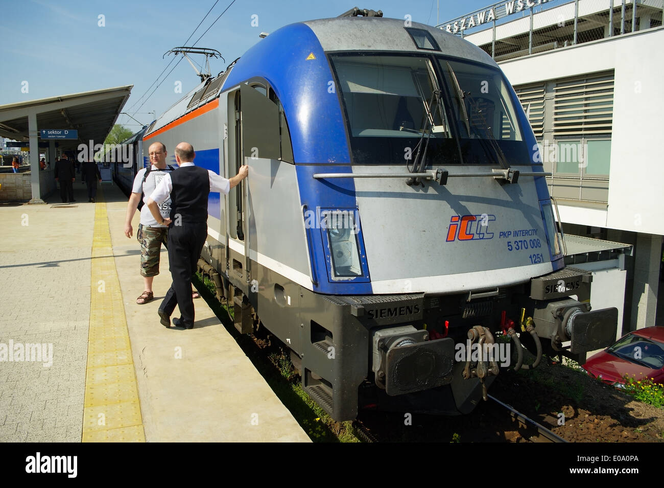 Express train pulled by Siemens EuroSprinter es64u4 locomotive on May 1, 2014 at Warsaw East railway station, Poland. Stock Photo