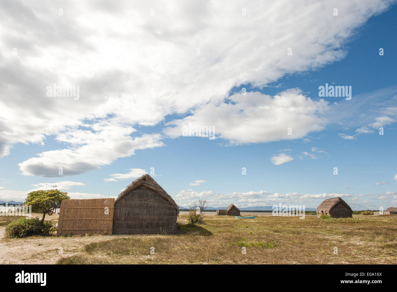 The traditional reed covered fishing huts at the Étang de Canet-Saint Nazaire near Perpignan date back as far as 1265. Stock Photo