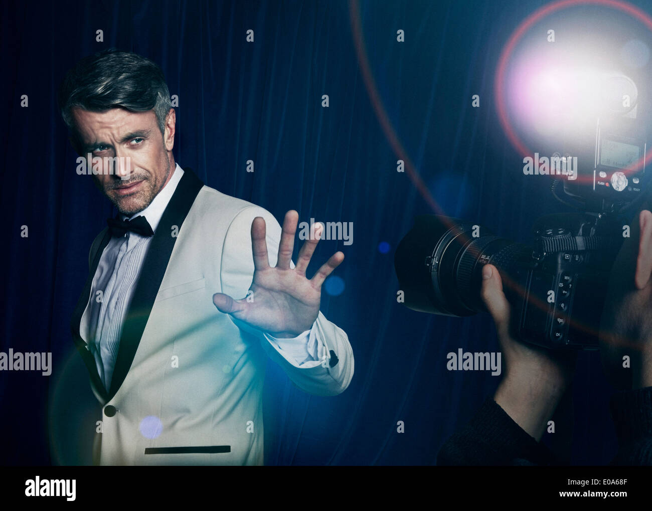 Paparazzi photographing celebrity Stock Photo - Alamy