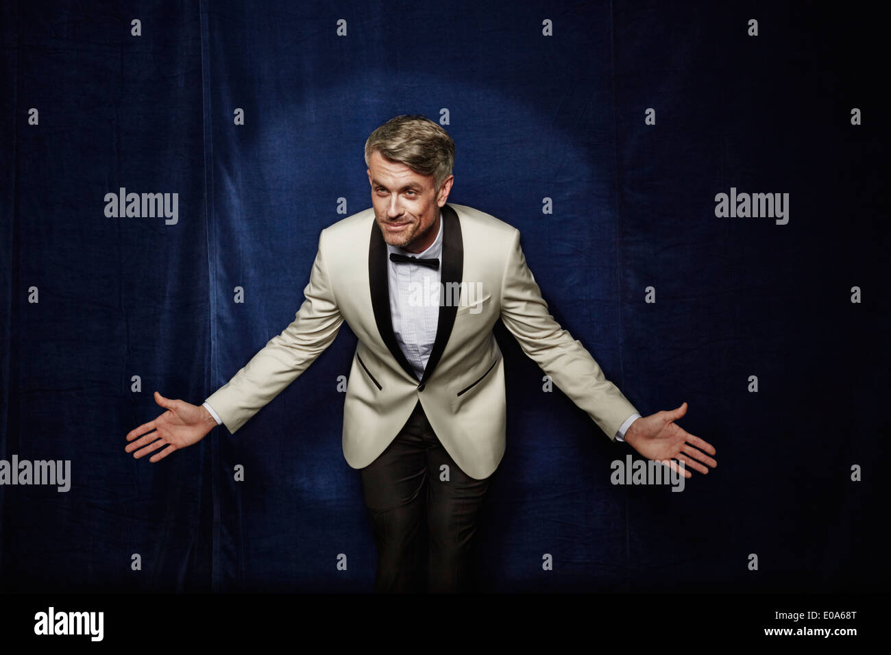 Male entertainer bowing Stock Photo