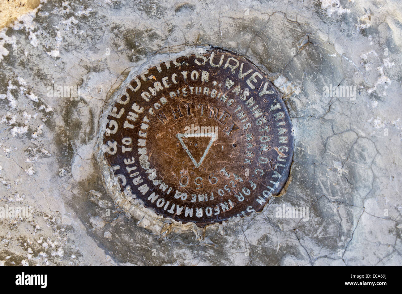 Mount Whitney summit benchmark on top of the highest peak in the contiguous 48 states Stock Photo