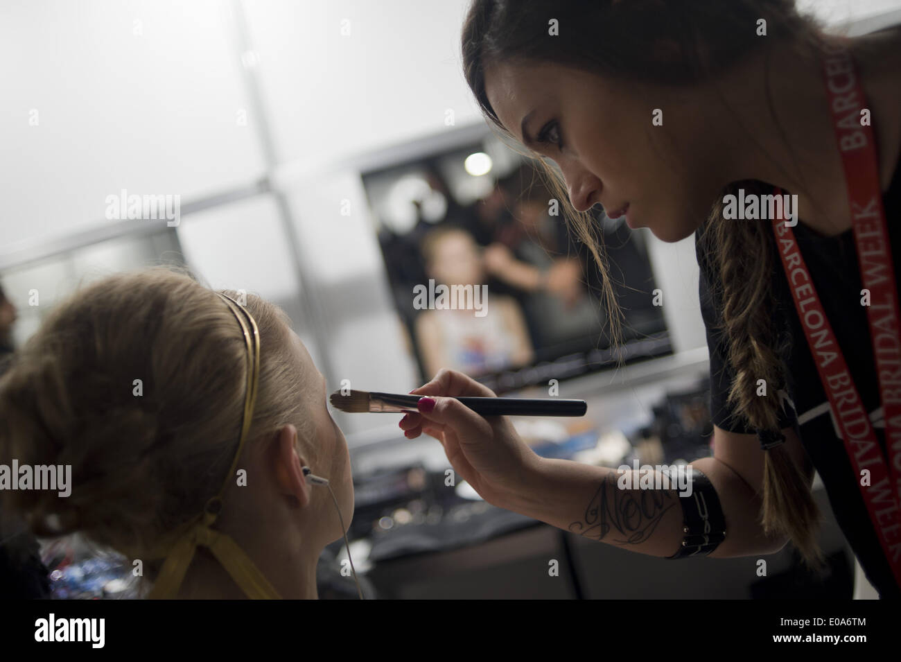 Barcelona, Spain. 7th May, 2014.   A model is prepared at the backstage of the Barcelona Bridal Week before leaving for the catwalk. Barcelona Bridal Week is a fashion industry event that includes Gaudi Novias (brides) Catwalk. Credit:  Jordi Boixareu/ZUMA Wire/ZUMAPRESS.com/Alamy Live News Stock Photo