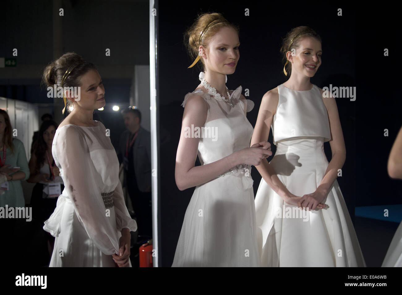 Barcelona, Spain. 7th May, 2014.   Models dressed as brides wait at the backstage corridors before going on catwalk. Barcelona Bridal Week is a fashion industry event that includes Gaudi Novias (brides) Catwalk. Credit:  Jordi Boixareu/ZUMA Wire/ZUMAPRESS.com/Alamy Live News Stock Photo