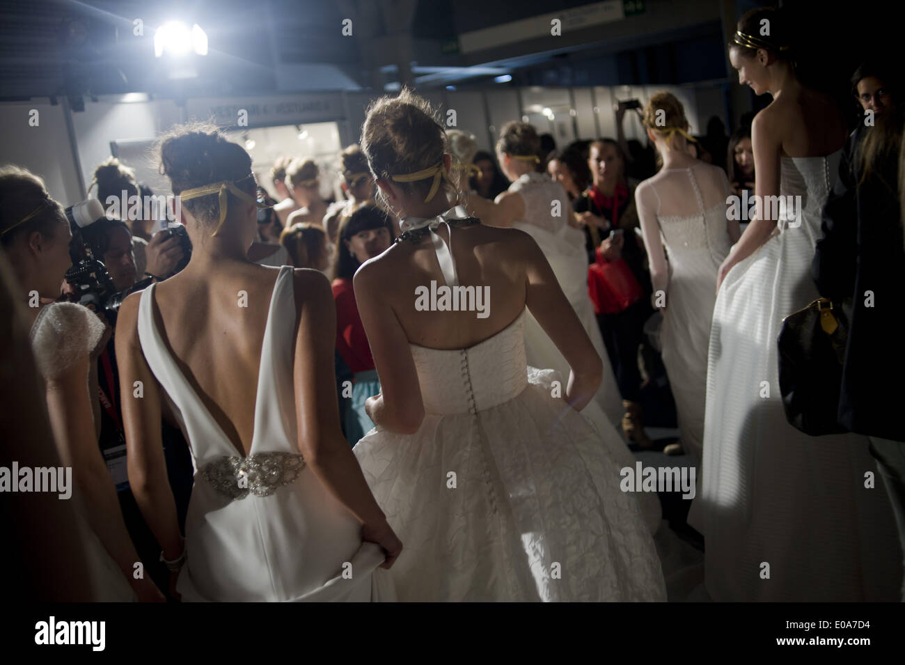 Barcelona, Spain. 7th May, 2014.   Models dressed as brides wait at the backstage corridors before going on catwalk. Barcelona Bridal Week is a fashion industry event that includes Gaudi Novias (brides) Catwalk. Credit:  Jordi Boixareu/ZUMA Wire/ZUMAPRESS.com/Alamy Live News Stock Photo