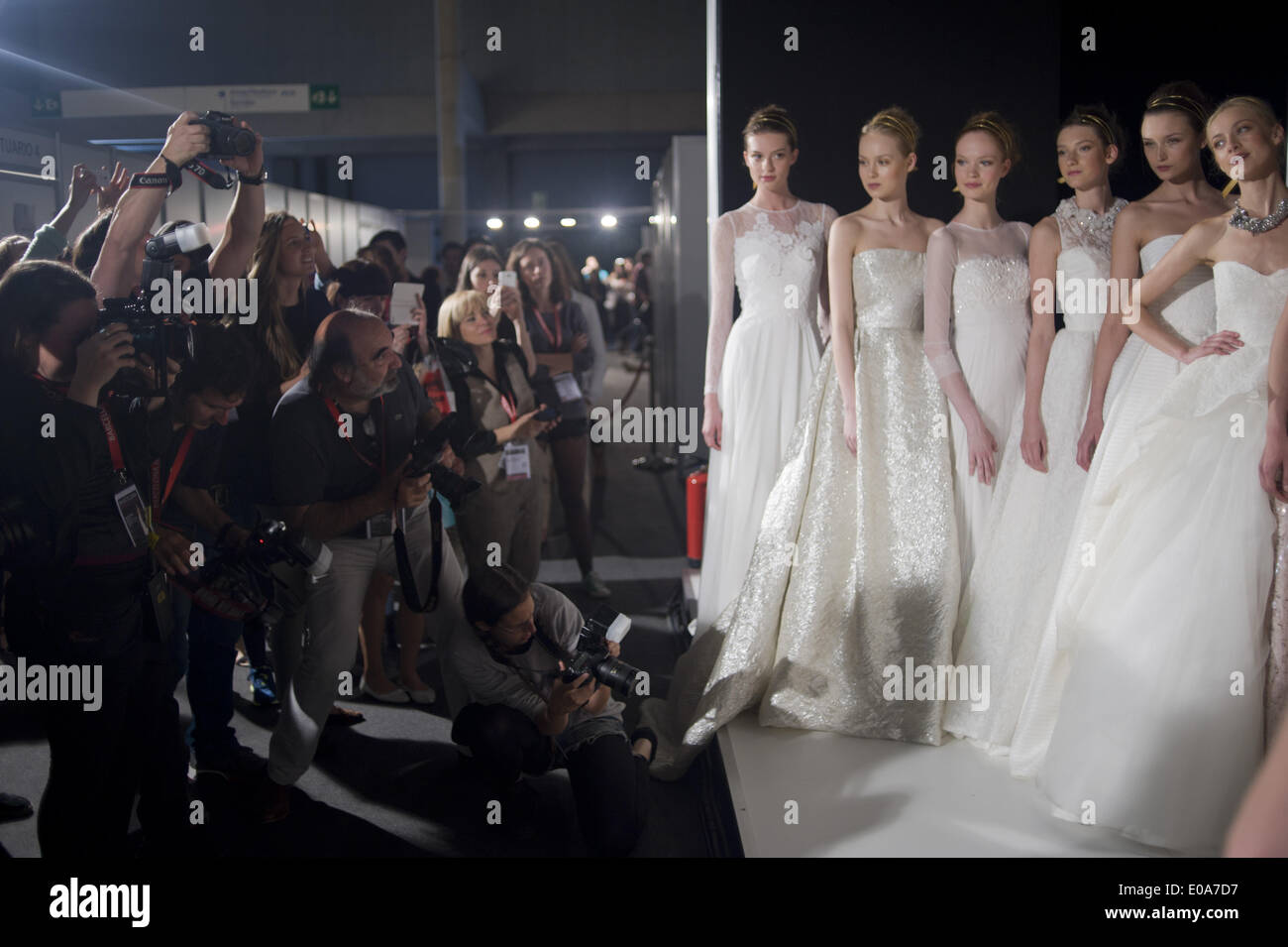 Barcelona, Spain. 7th May, 2014.  A group of photographers shooting a group of models dressed as brides. Barcelona Bridal Week is a fashion industry event that includes Gaudi Novias (brides) Catwalk. Credit:  Jordi Boixareu/ZUMA Wire/ZUMAPRESS.com/Alamy Live News Stock Photo