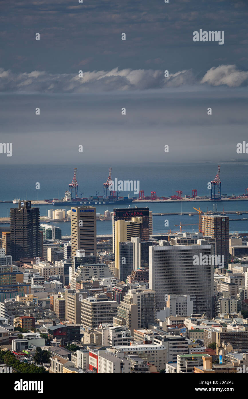 Cape Town South Africa, a view over the harbor as seen from the slopes of Signal Hill. A bank of clouds is in the distance. Stock Photo