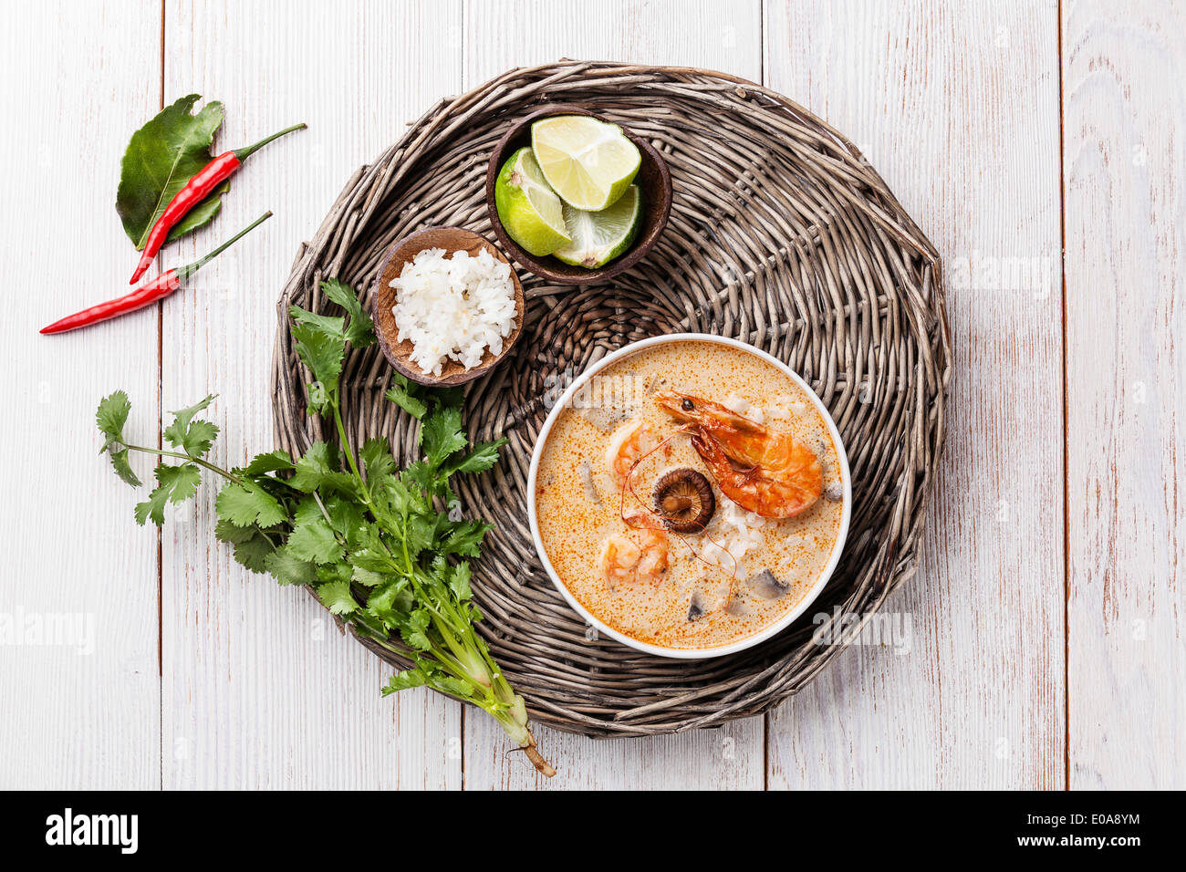 Spicy Thai soup Tom Yam with Coconut milk, Chili pepper and Seafood