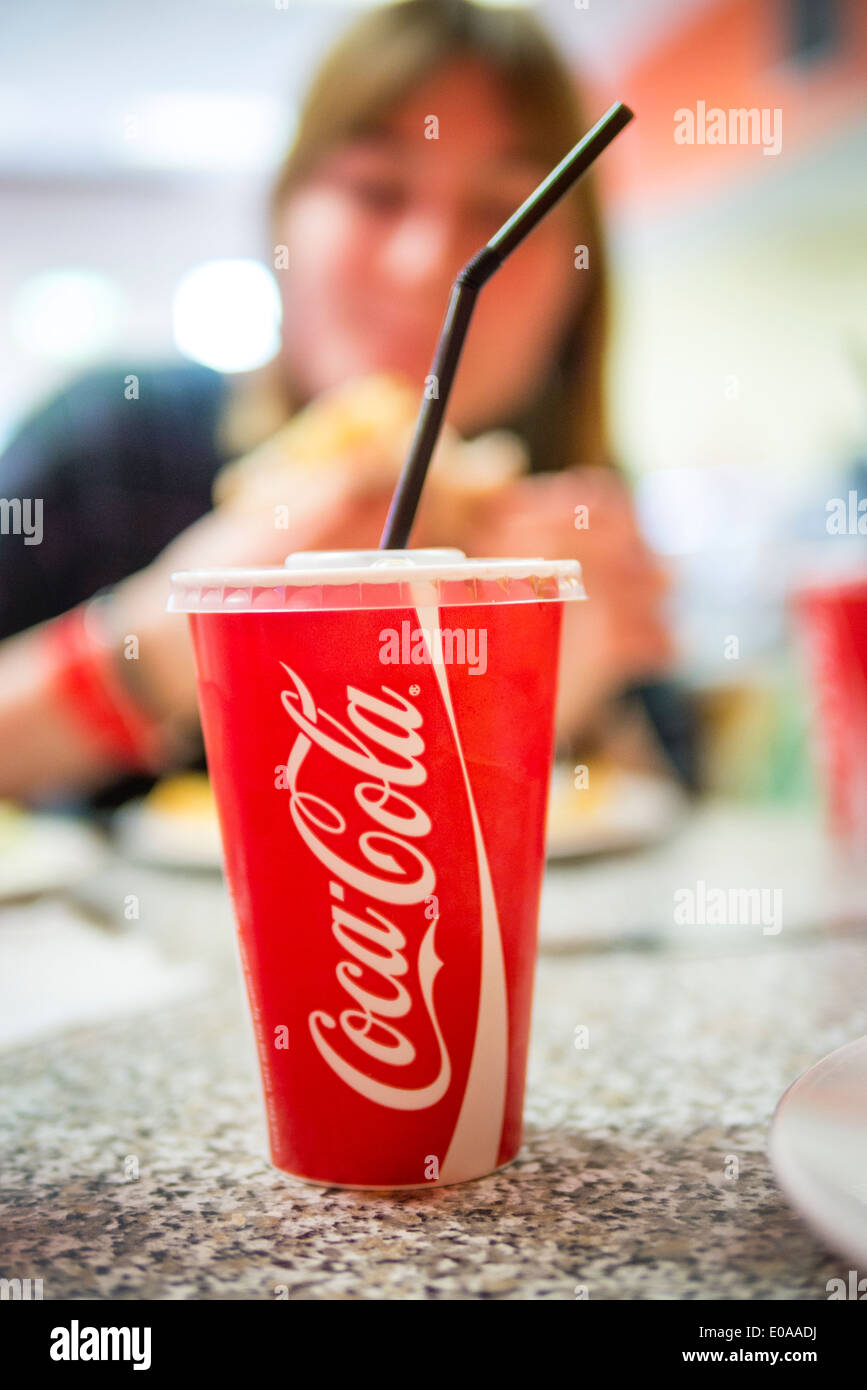 Cup of Take Away Coca-Cola Drink with Straw. Stock Photo