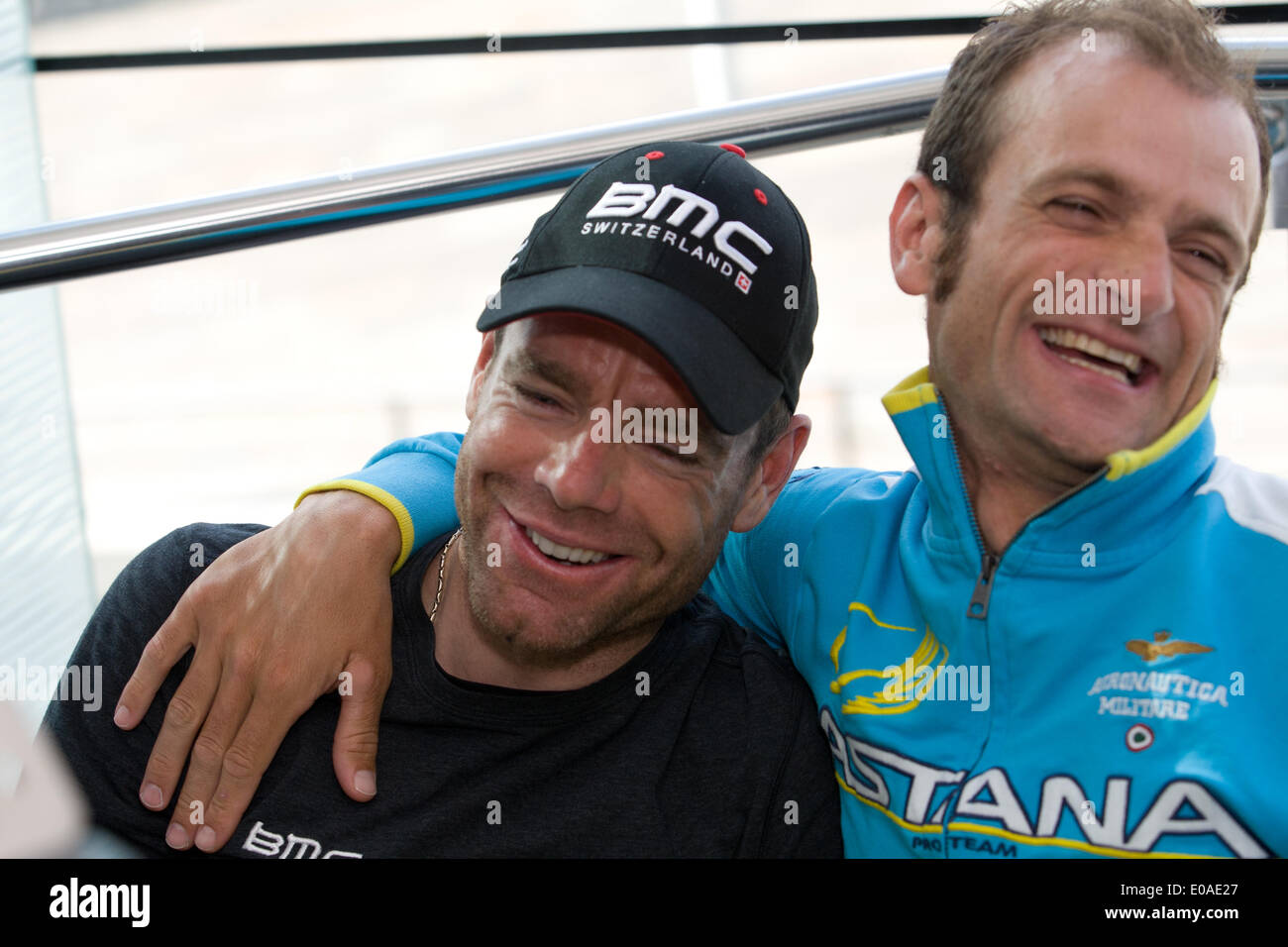 Waterfront Hall, Belfast,UK. 7th May 2014. Cadel Evans,Team BMC Racing and Michele Scarponi, Team Astana sharing a lighter moment at the Giro top riders press conference ©Bonzo/Alamy Live Stock Photo