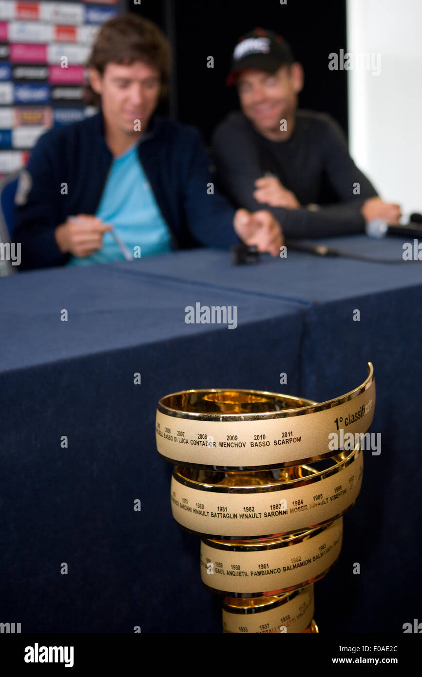 Waterfront Hall, Belfast,UK. 7th May 2014. Trofeo Senza Fine in the front with Rigoberto Uran,Team Omega Pharma-Quick Step and Cadel Evans,Team BMC Racing in the background at the Giro top riders press conference ©Bonzo/Alamy Live Stock Photo