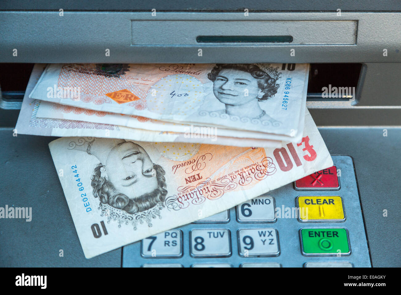 Old Ten pound notes,  now withdrawn in March 2018 ,replaced by new polymer notes, dispensed from a cash machine ATM London England UK Stock Photo