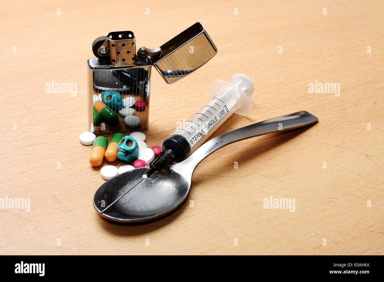 syringe, spoon,pills,skull and lighter on the floor Stock Photo Alamy