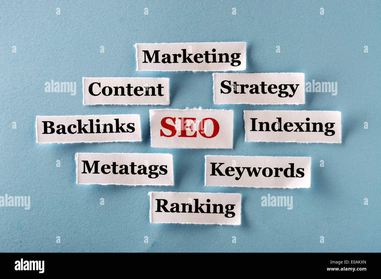 Seo Word Humbnail SEO Word Cloud printed on paper on blue font Stock Photo - Alamy