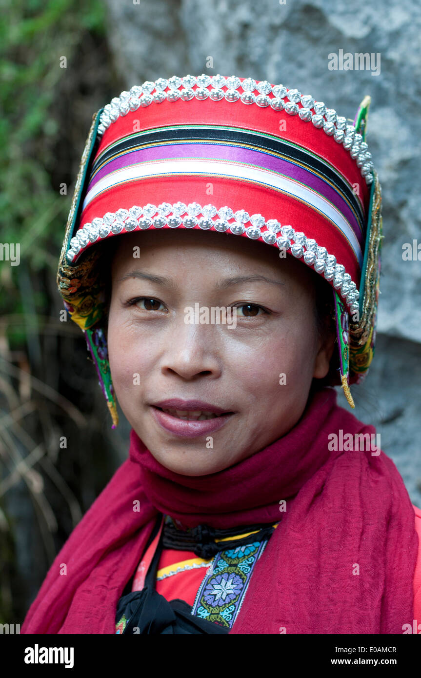 Bai woman with traditional headdress, Shilin Stone Forest, Yunnan, China Stock Photo