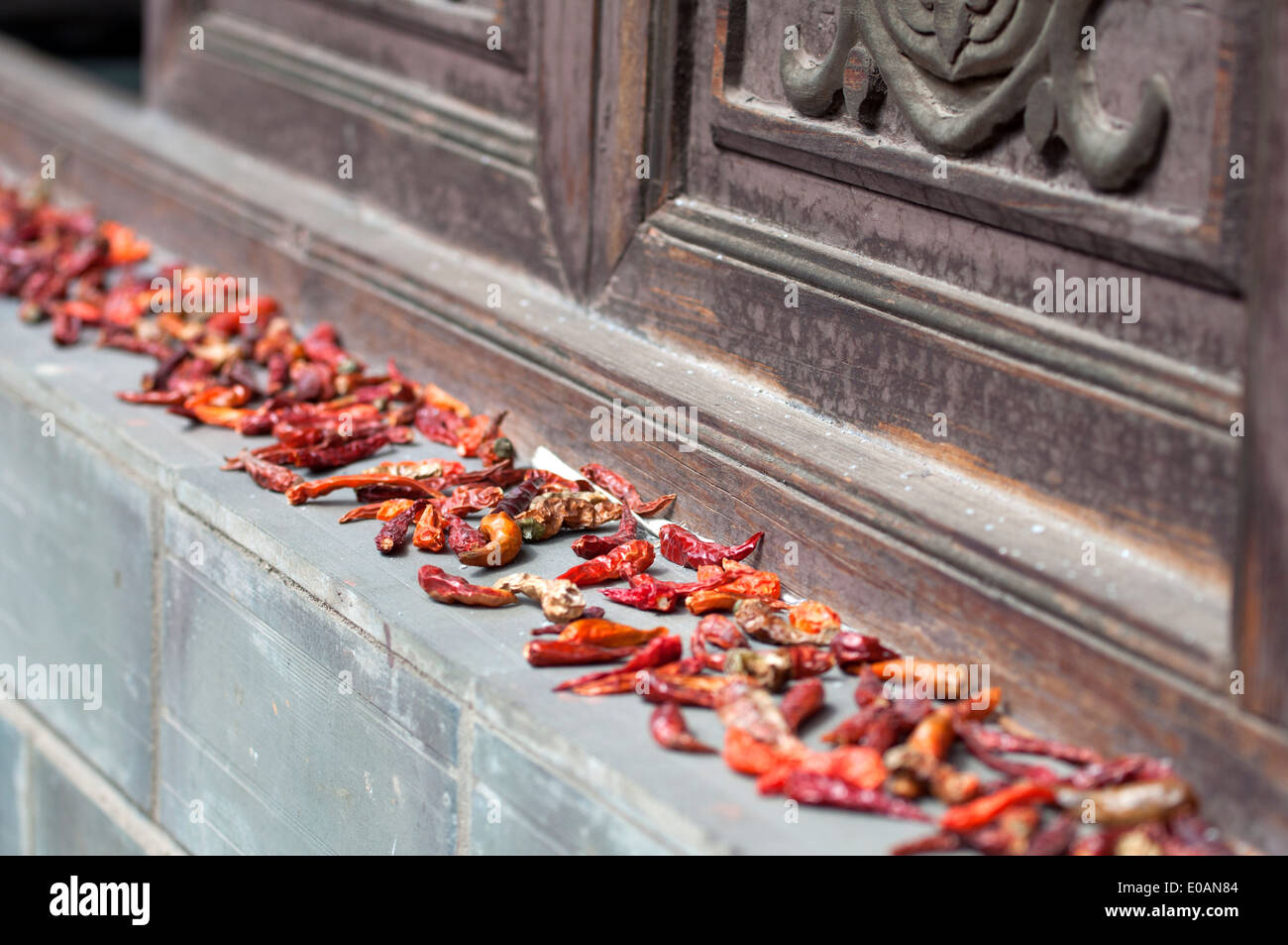 Chili pepper drying, Jiansui Old Town, Yunnan, China Stock Photo
