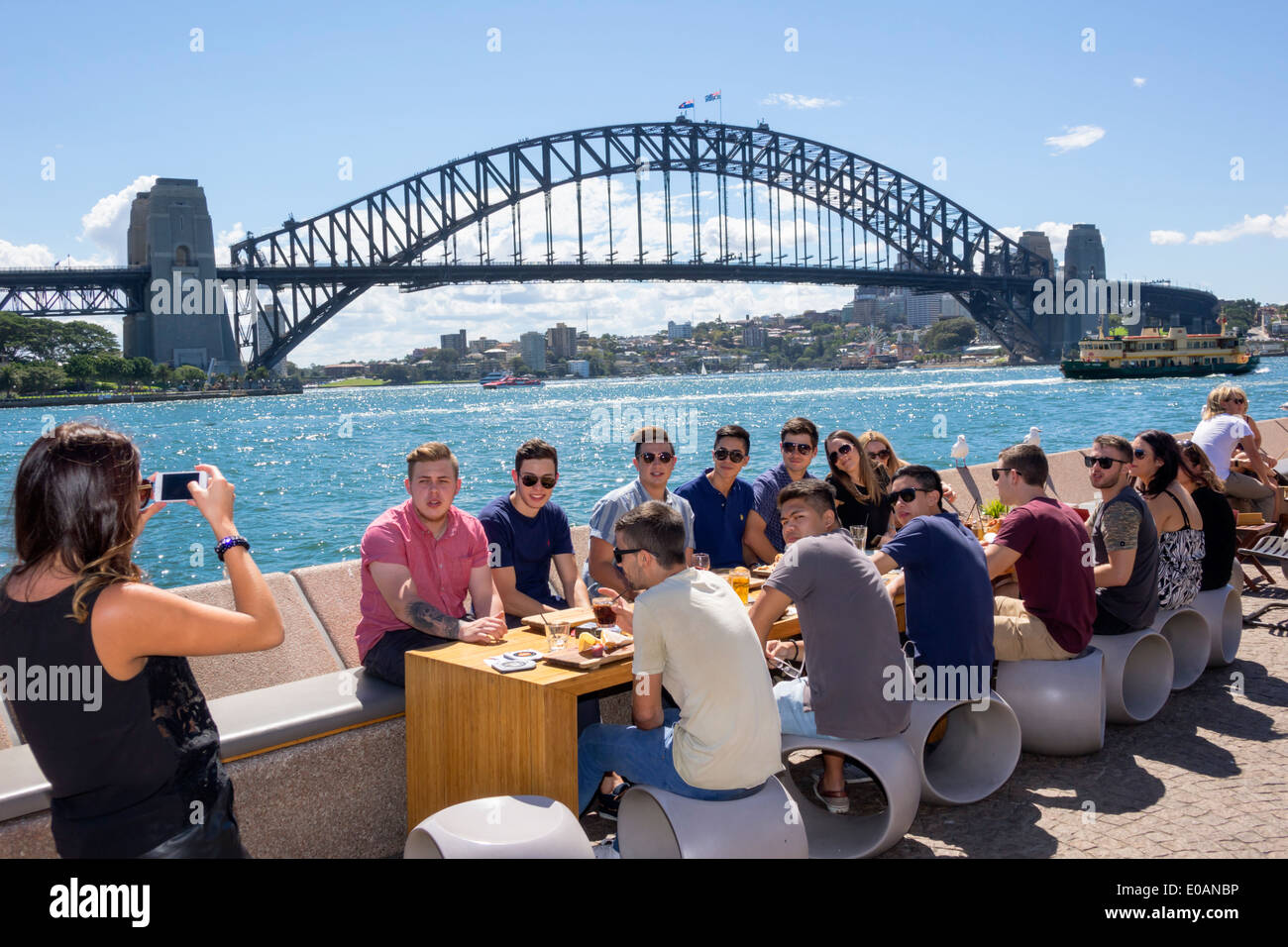 Sydney Australia,East Circular Quay,promenade,Sydney Harbour Bridge,harbor,promenade,Opera Bar,restaurant restaurants food dining cafe cafes,al fresco Stock Photo