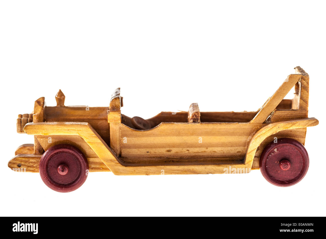 a wooden old toy car isolated over a white background Stock Photo - Alamy