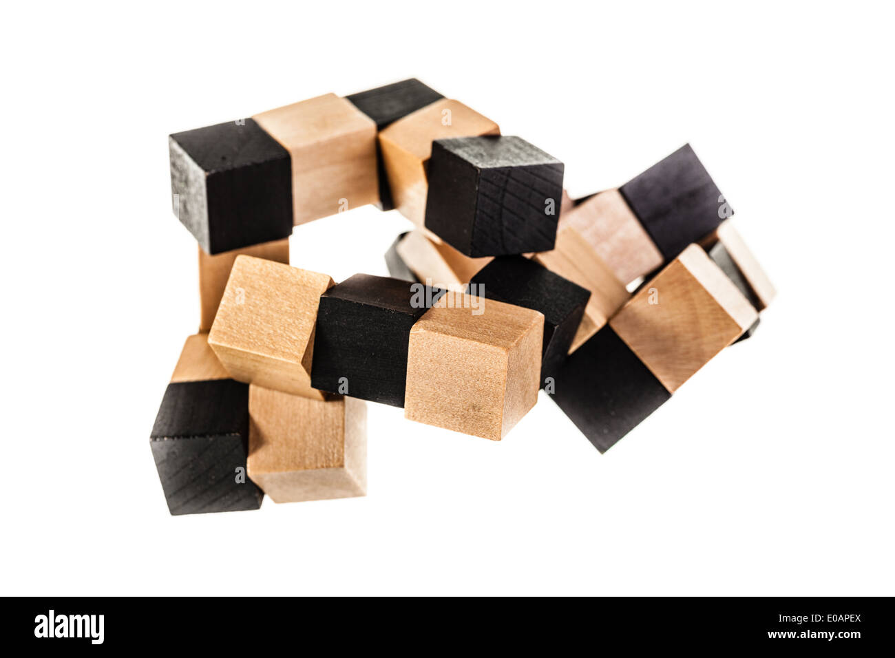 a wooden puzzle isolated over a white background Stock Photo - Alamy