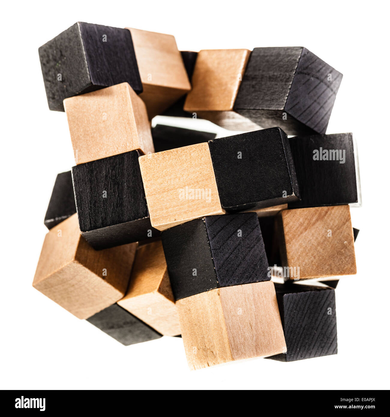 a wooden puzzle isolated over a white background Stock Photo - Alamy