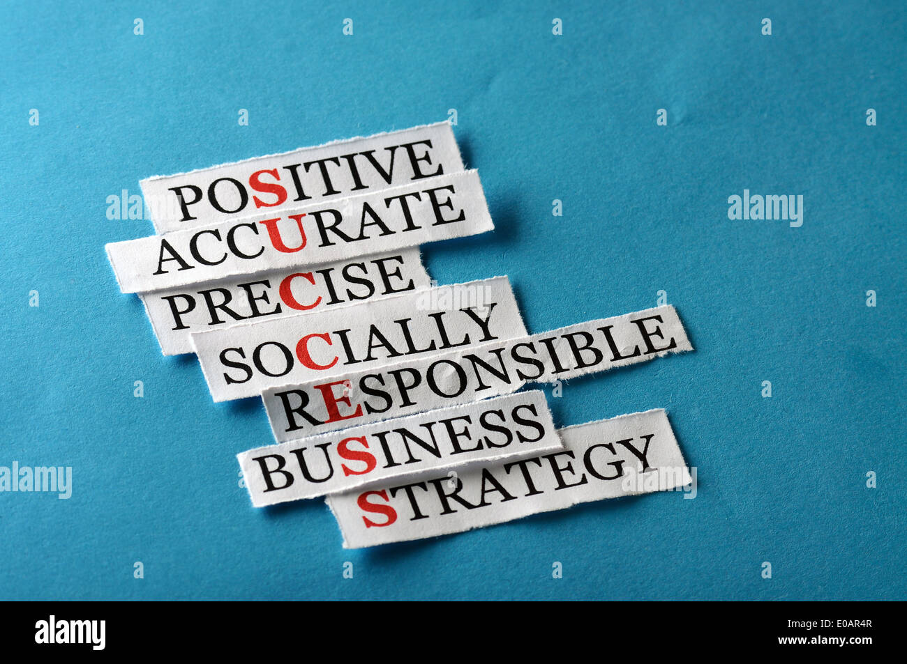 Success acronym in business concept, words on cut paper hard light  Stock Photo