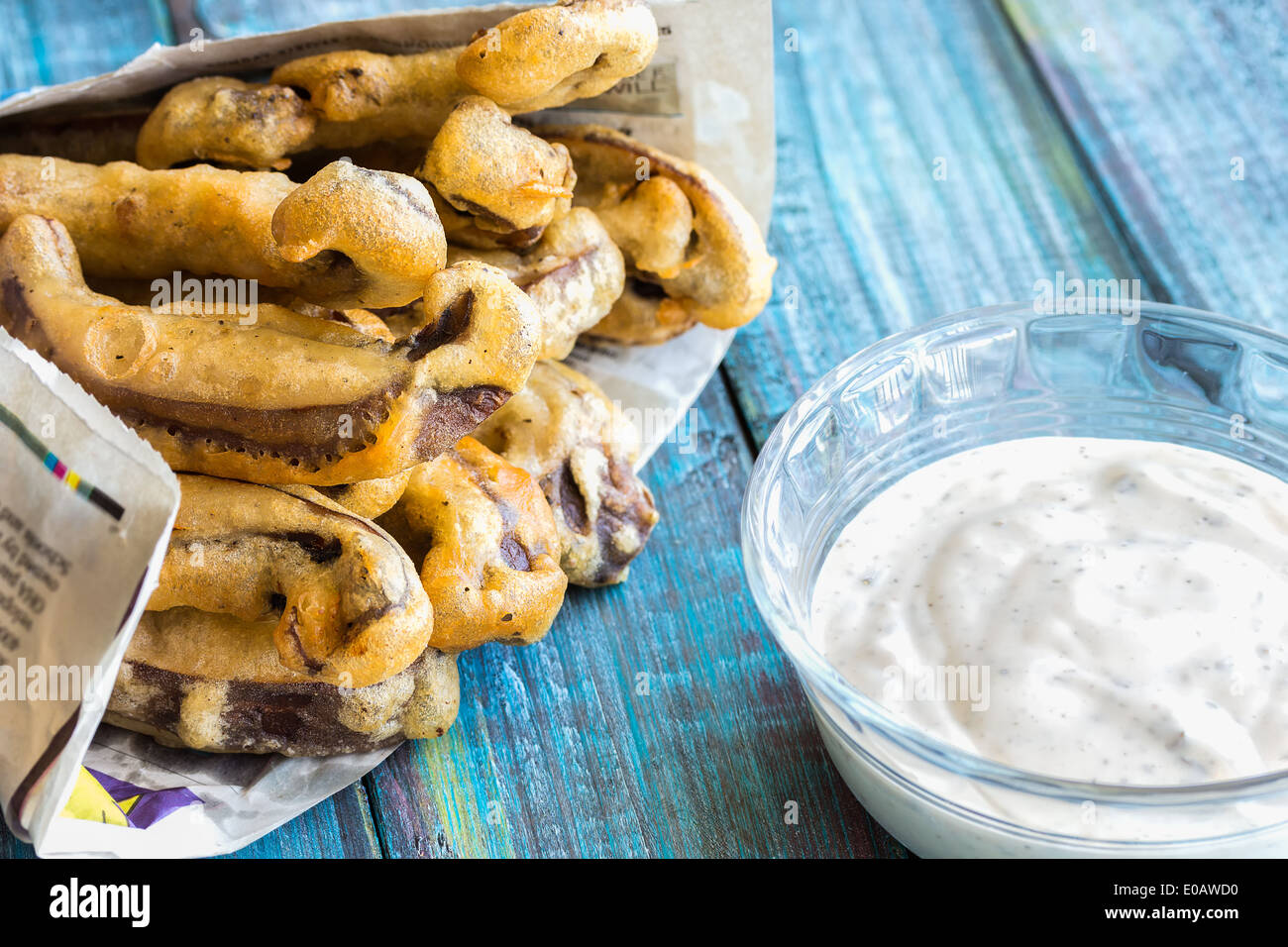 Beer battered portobello mushroom fries with herbed yogurt dipping
