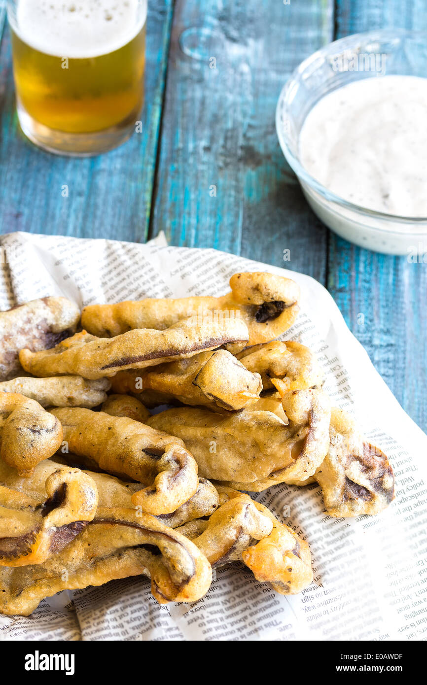 Beer battered portobello mushroom fries with herbed yogurt dipping