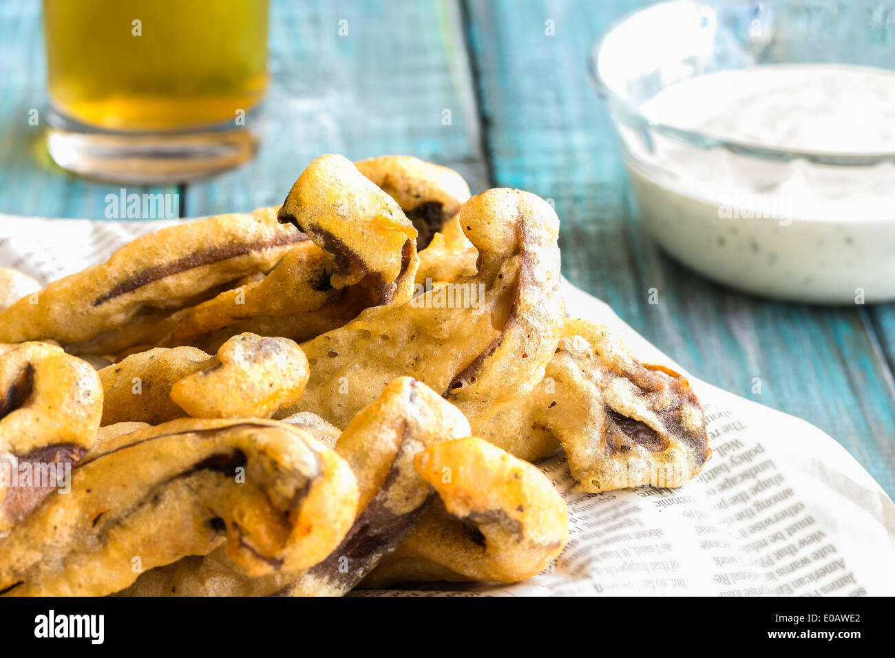 Beer battered portobello mushroom fries with herbed yogurt dipping