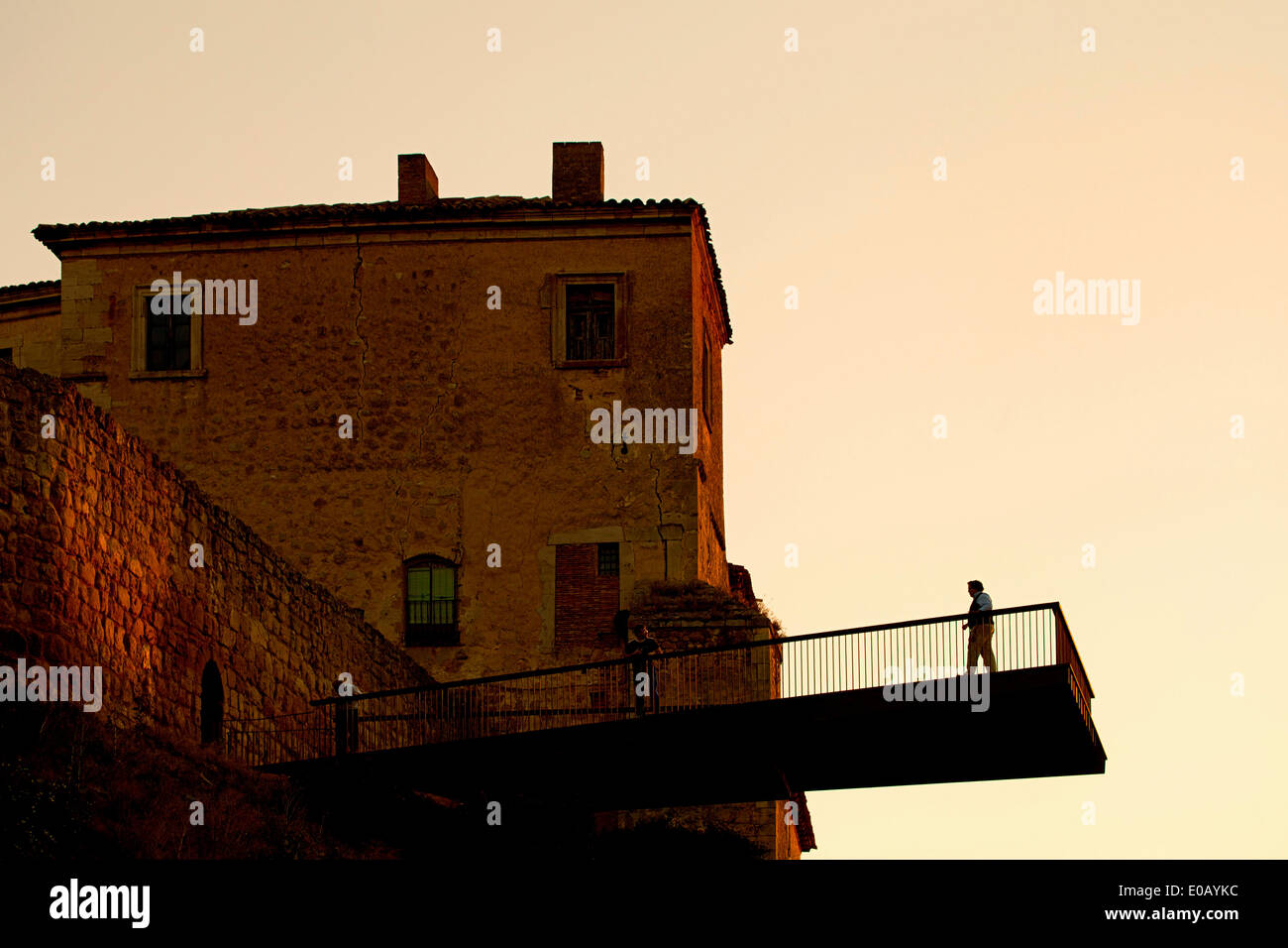 Plaza Mayor and Cantilevers over Duero River, Almazán, Spain. Architect: ch+qs, 2012. Detail of cantilever balcony in warm eveni Stock Photo