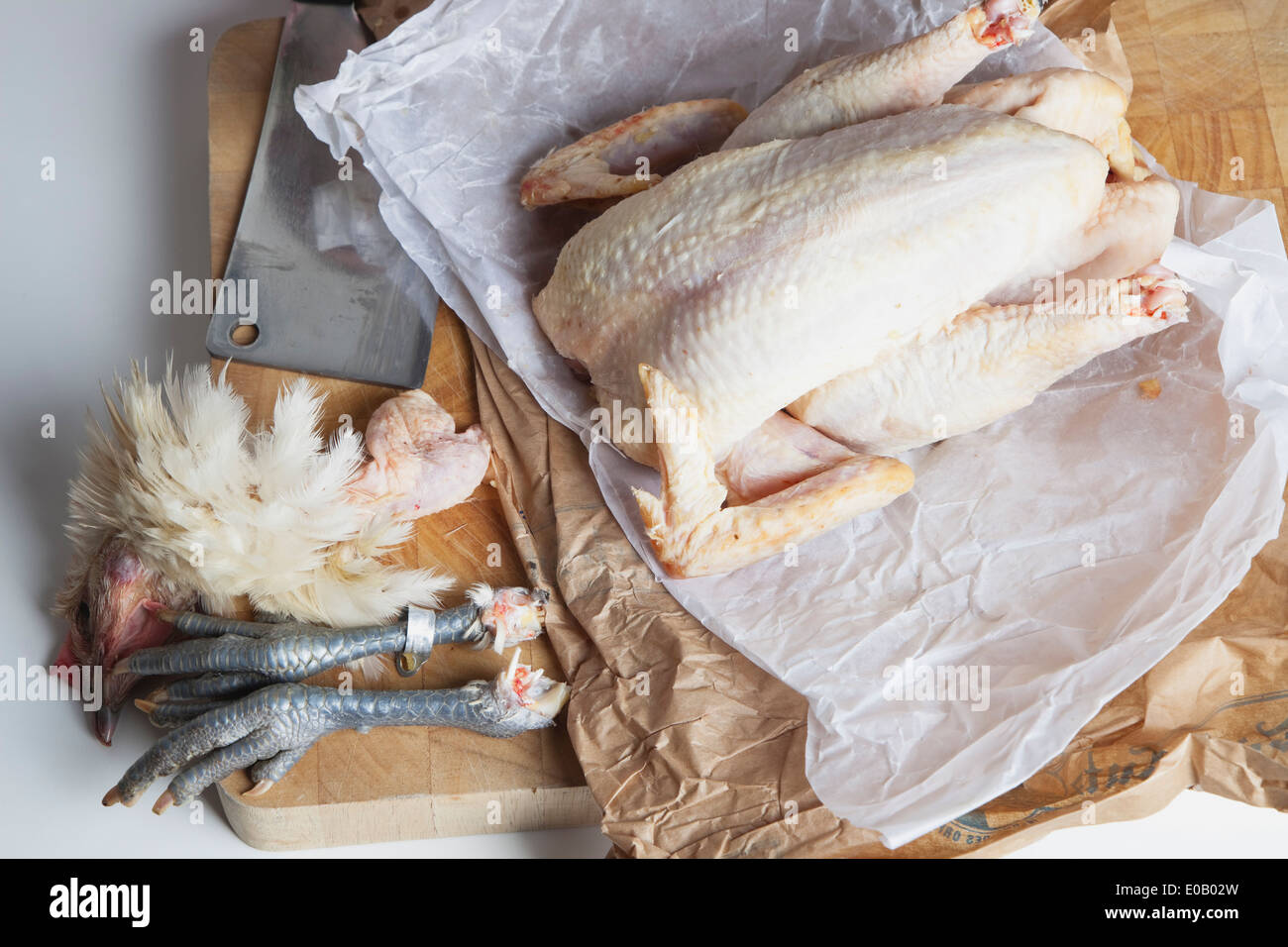 Raw Bresse chicken on chopping board Stock Photo Alamy